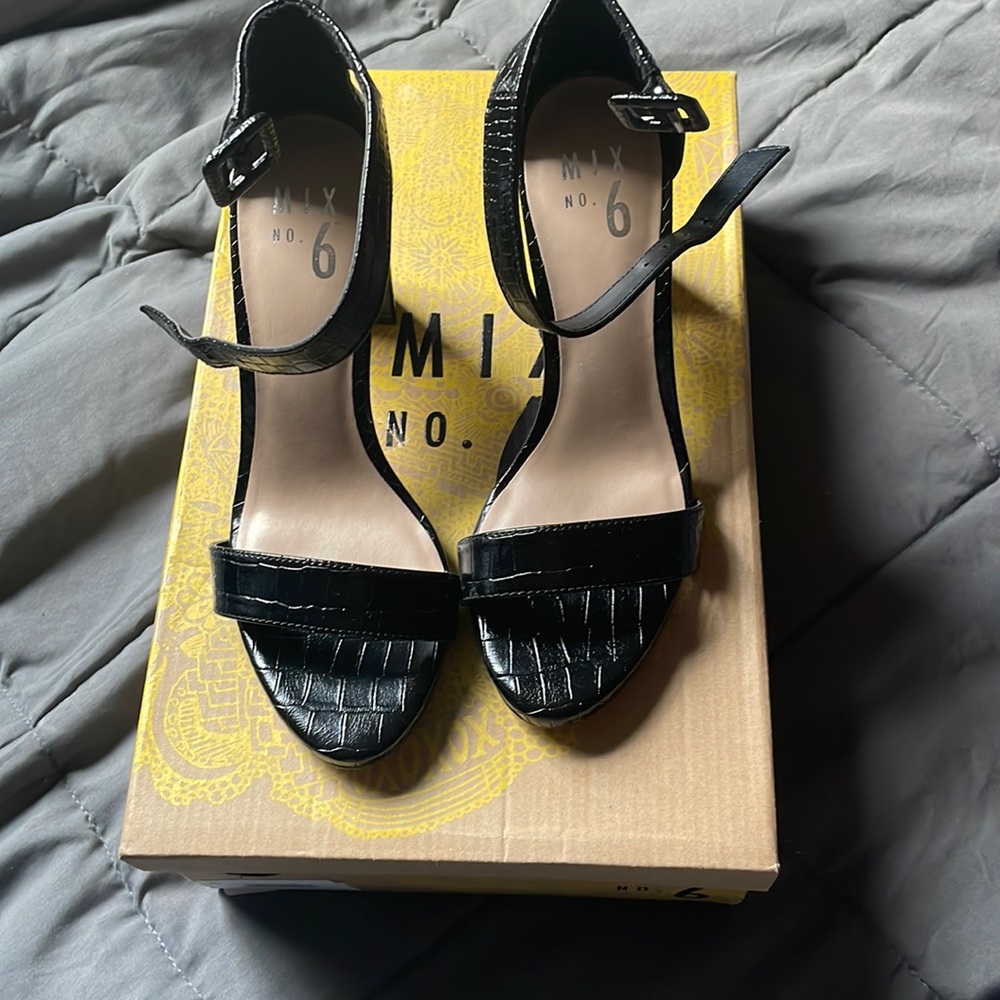 Nice Black heels. Size 6. Worn once. Original box